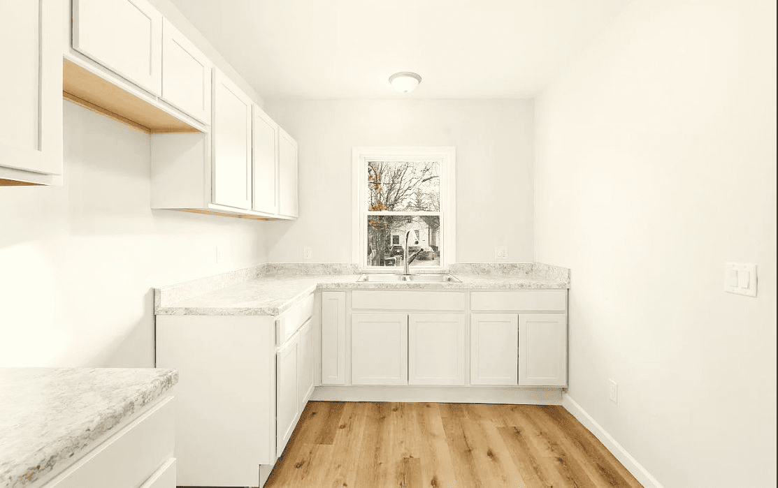 Newly renovated kitchen with window over sink
